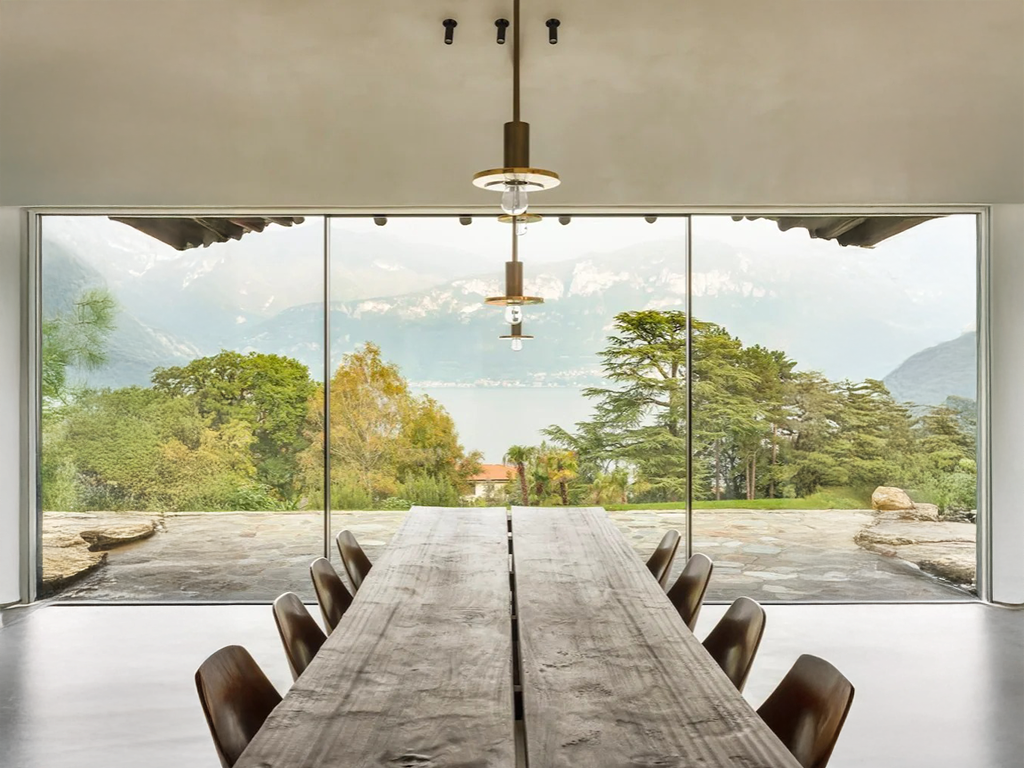 Rustic Dining with a View: Raw Wood and Scenic Calm
