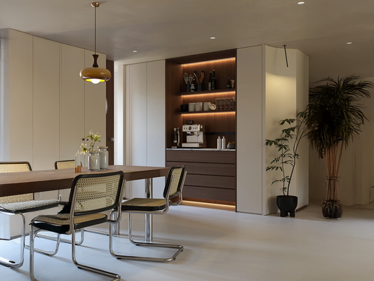 The Art of Balance: Cane Dining Chairs and Vintage Pendant Glow